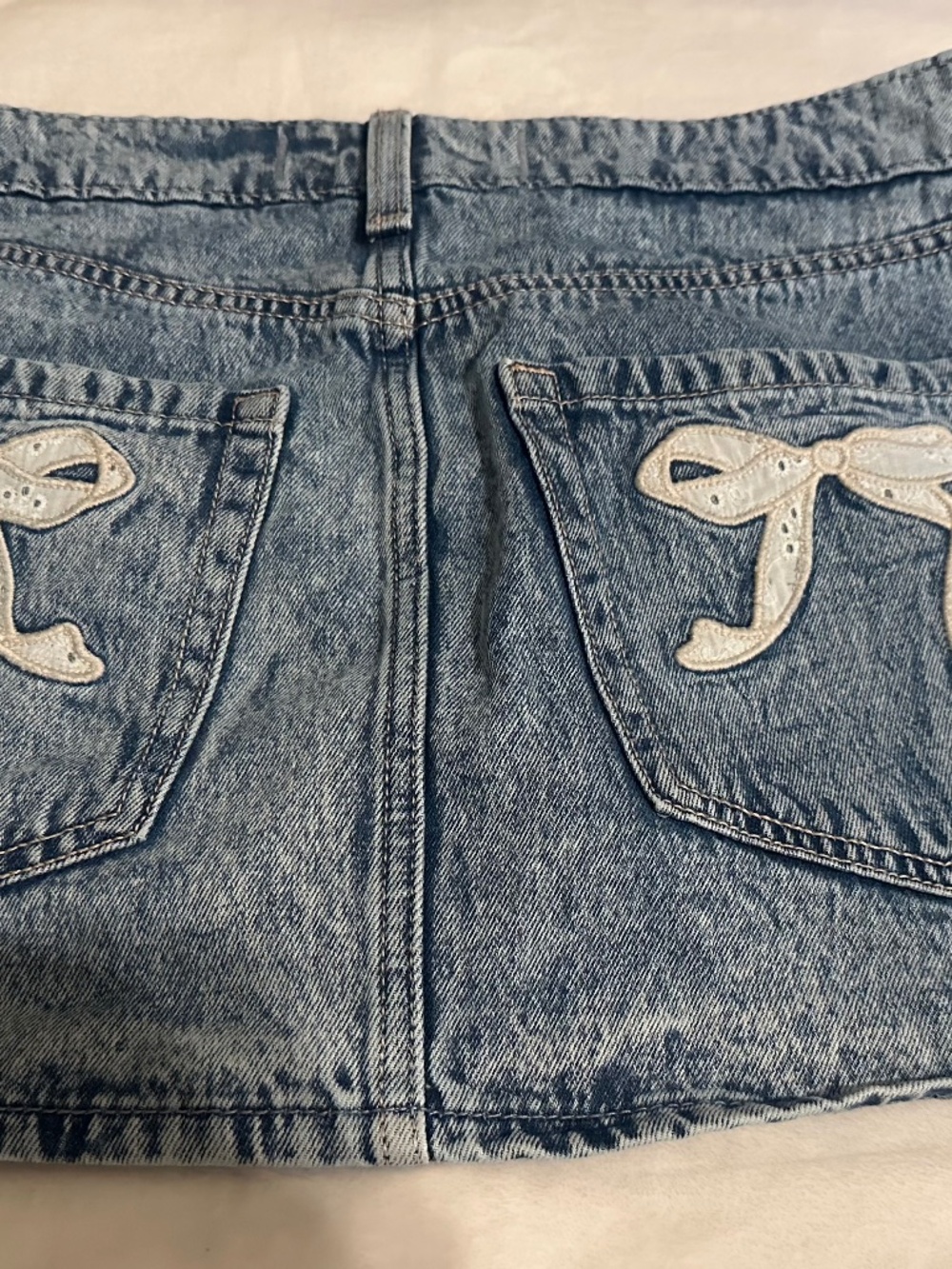 hollister bow jean skirt